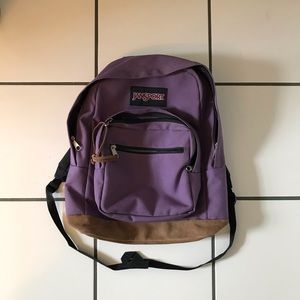 Purple and leather Jansport Backpack